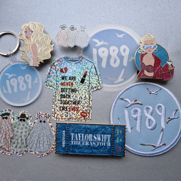 The full TS set (4 pins, 3 stickers, 1 keychain & 1 patch)